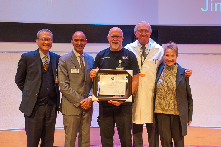 Jim Behme (center) winner of this year's Peter J. Deckers Award.